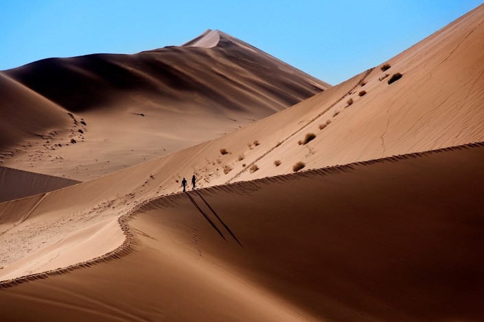 Dune walking in the Namib Desert at Sossusviel in Namibia